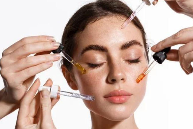 Women applying Face Treatment & Serum