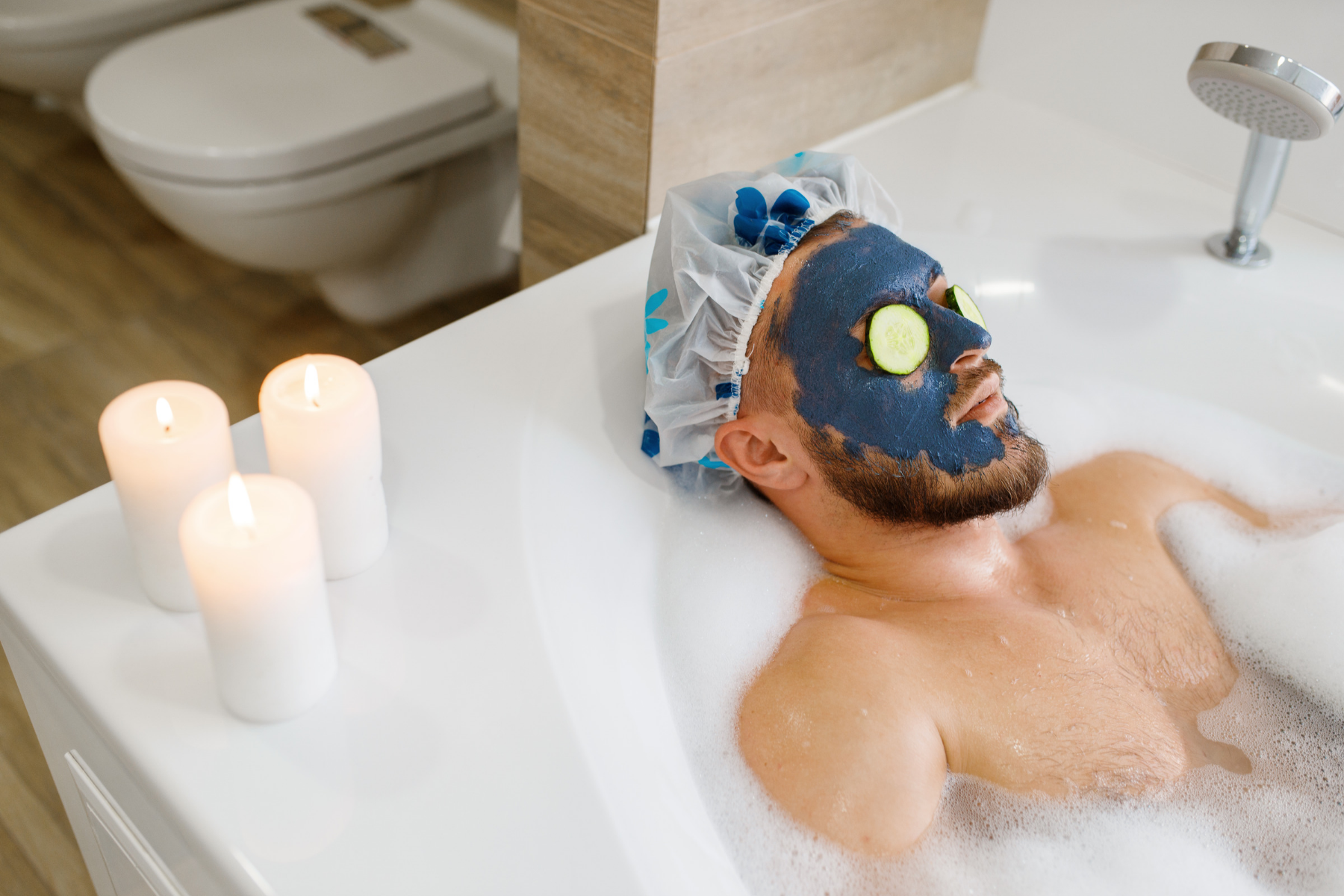 Man wearing face mask in bubble bath.